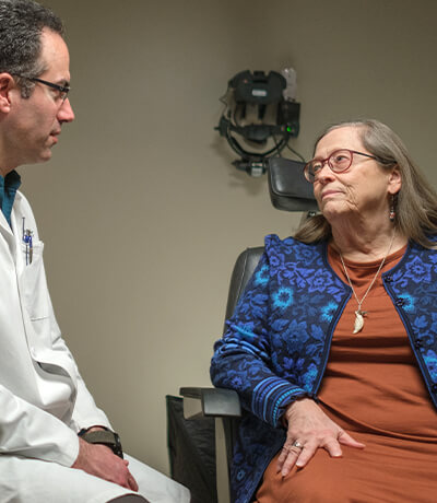 A female patient consulting with one of the providers